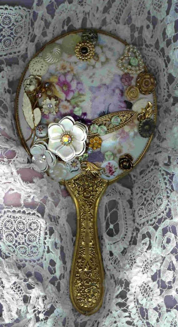 Floral Porcelain Antique hand mirror with original hand