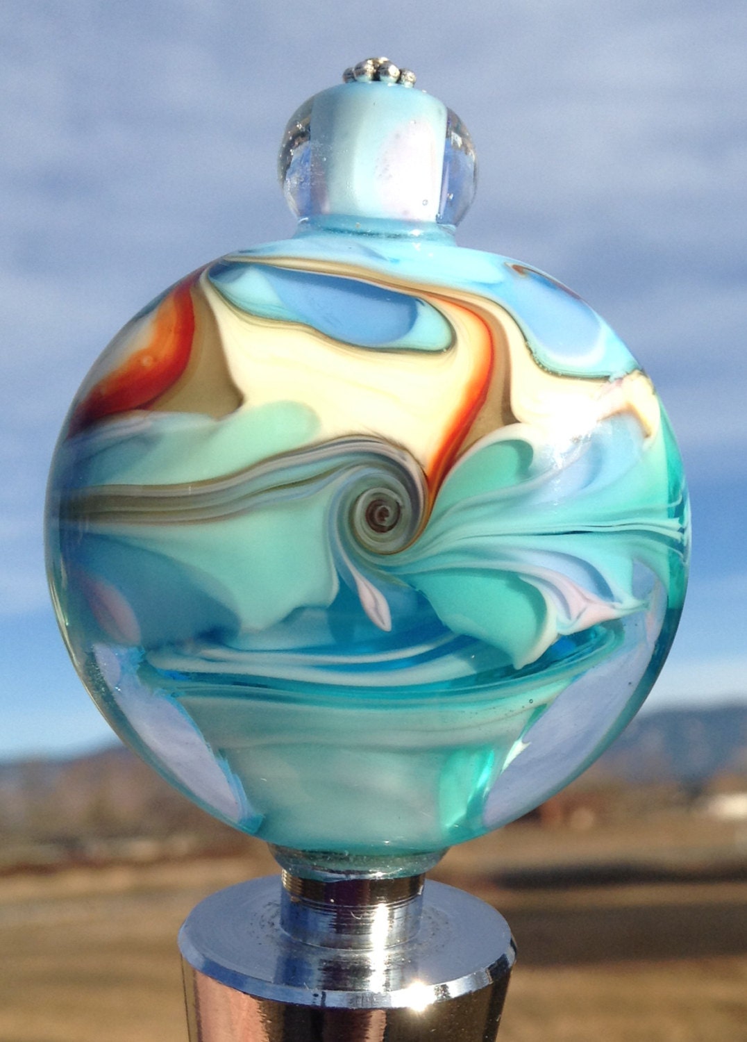 Hand Blown Glass Wine Bottle Stopper representing the 4