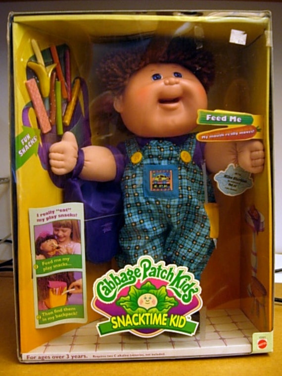 cabbage patch doll eats food