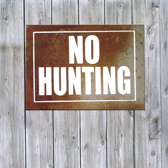 Items similar to No Hunting sign on Rusted Metal on Etsy