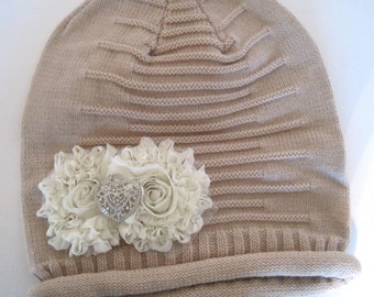 Tan Girls Slouch Beanie with Ivory Chiffon Flower and a Silver and Rhinestone Heart Accent.