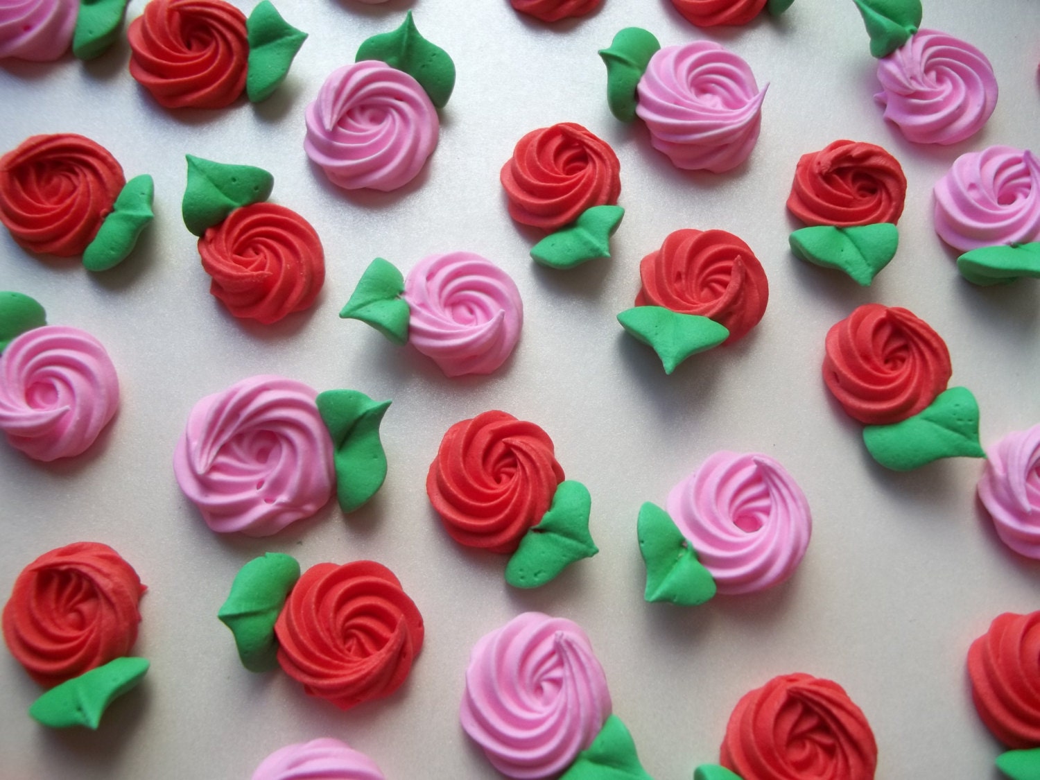 Red and pink royal icing rosettes with by SweetSarahsBoutique