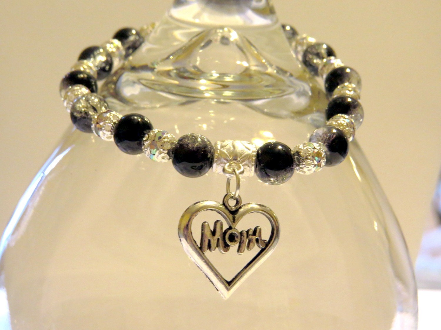 Mom Stretch bracelet. Silver rhinestone beads and black and