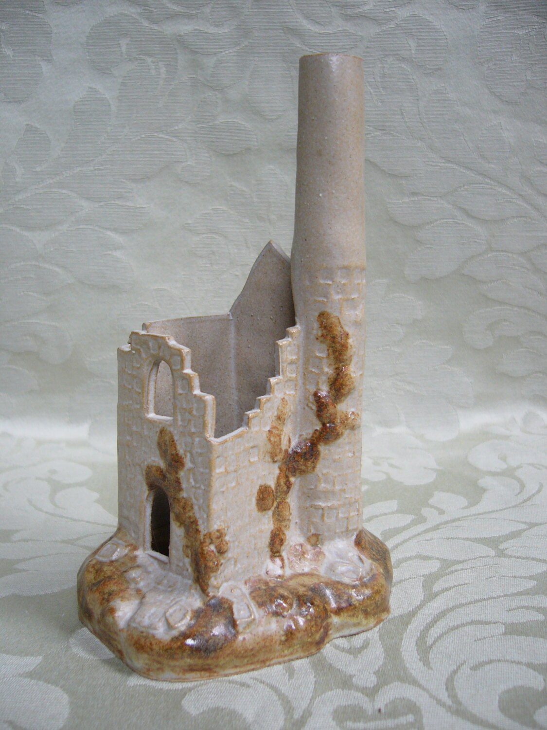 Clay sculpture of a cornish tin mine engine house by David
