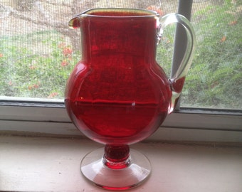 CRANBERRY RED GLASS pitcher with clear handle and base