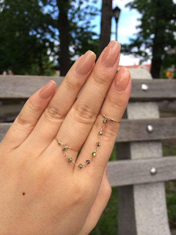 https://www.etsy.com/listing/190733055/mid-finger-chained-rings-with-smoky?ref=shop_home_feat_3