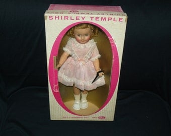 Shirley Temple Doll, almost Mint condition, 1950s with Original Box, made by The Ideal Co. 15 inches tall.