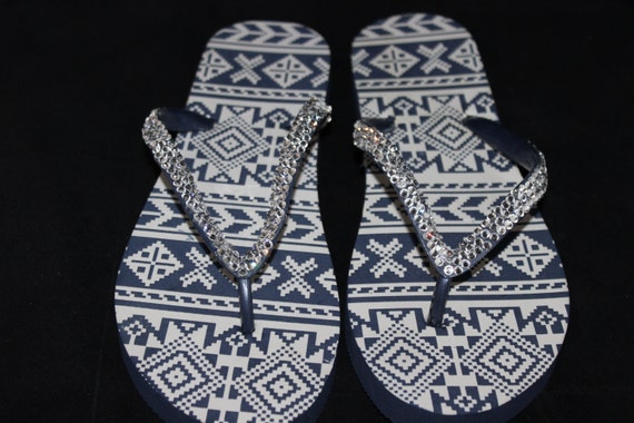 navy blue flip flops with bling