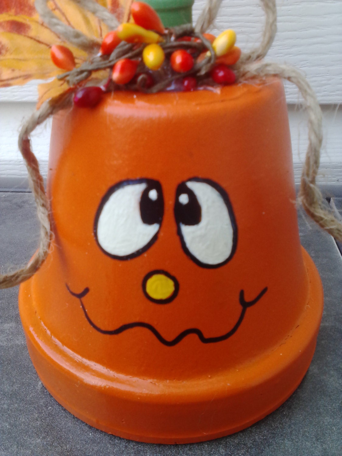 Halloween decoration Clay pot pumpkin. Clay pot decor. Hand