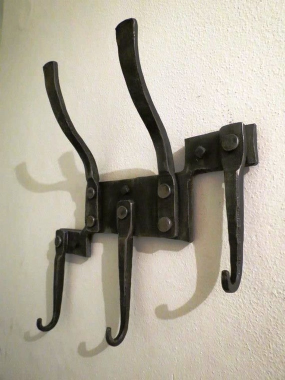 Hand iron wall hanger/coat hanger