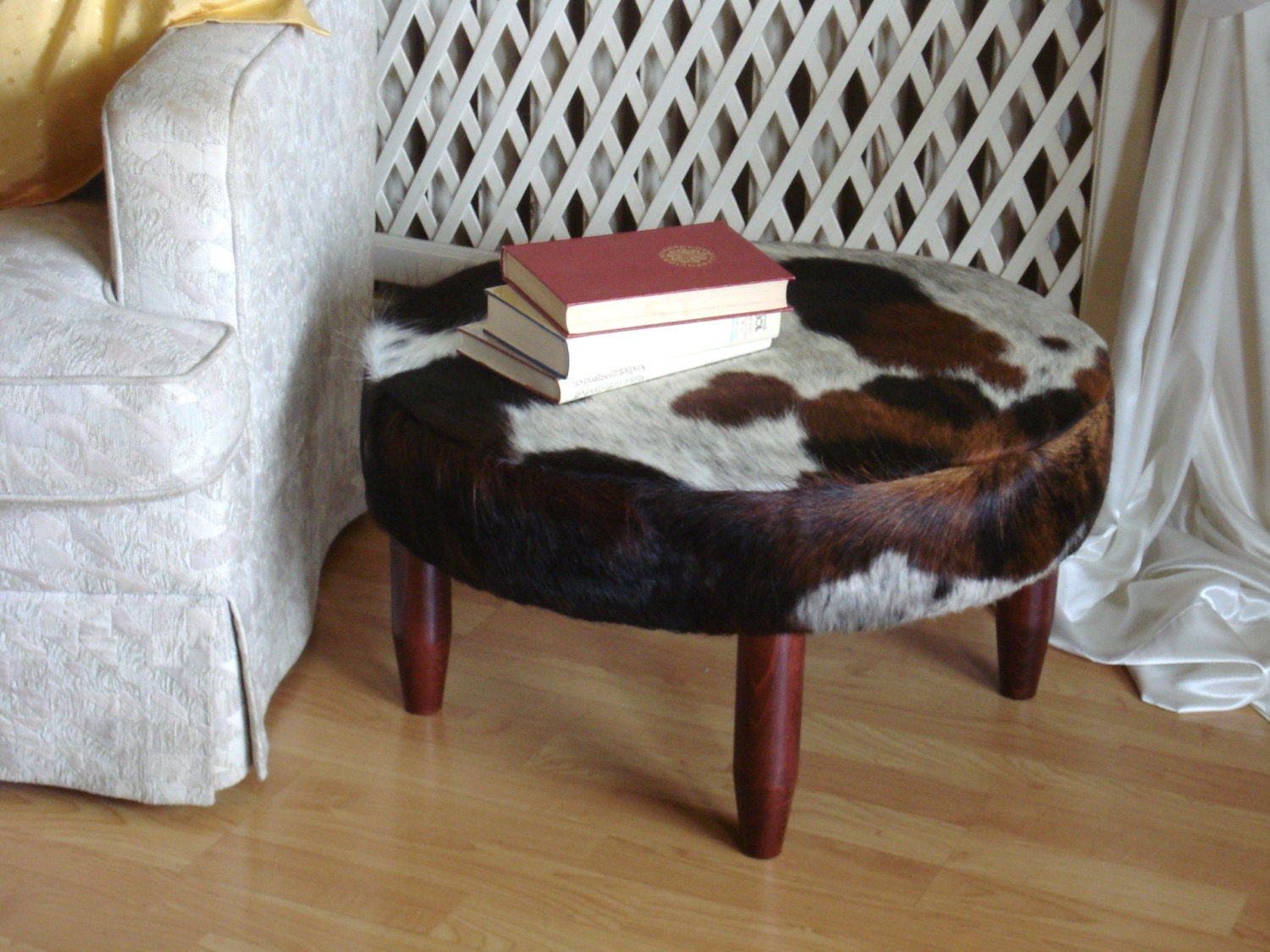 round cowhide footstool ottoman available now by MoxBelox on Etsy