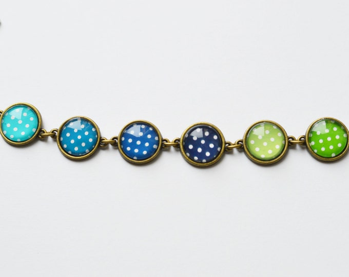 POLKA DOT Bracelet made from metal brass with blue-green peas under glass