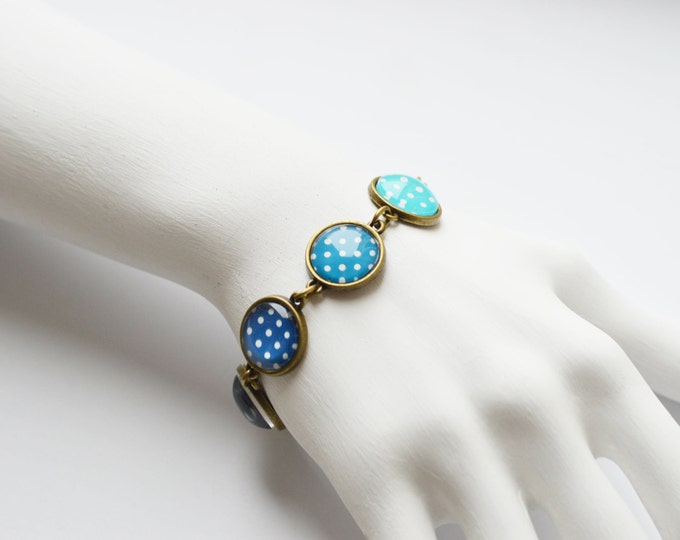 POLKA DOT Bracelet made from metal brass with blue-green peas under glass