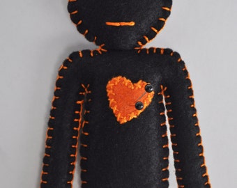 orange voodoo doll