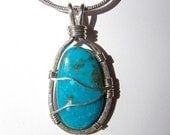 Campitos Turquoise Pendant Wrapped in Sterling Silver Wire