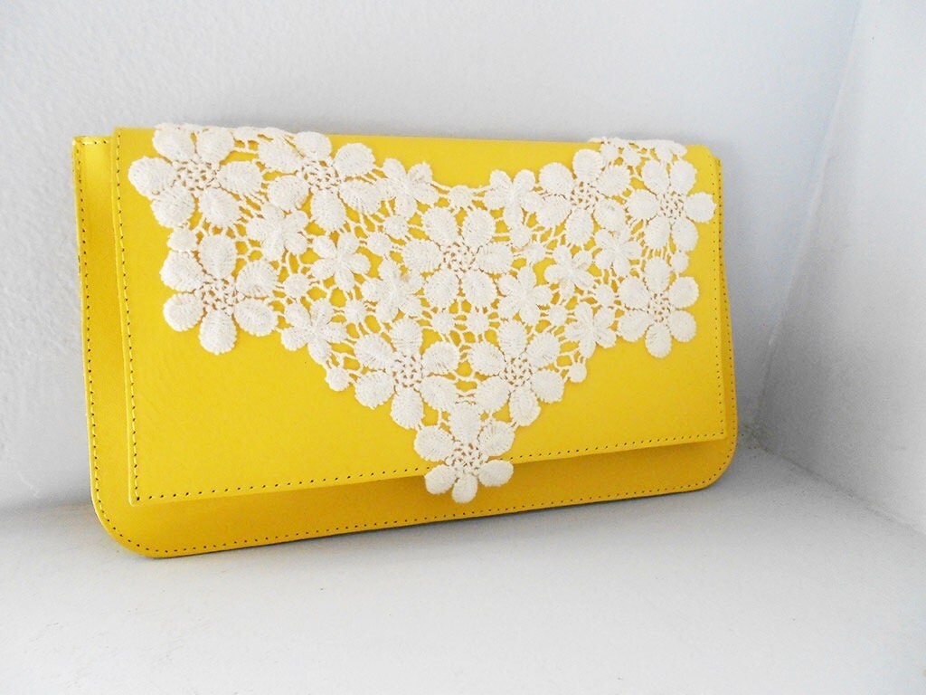 yellow and white clutch