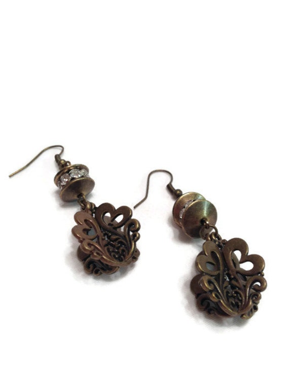 Items similar to handmade dangle earrings/ antique bronze and