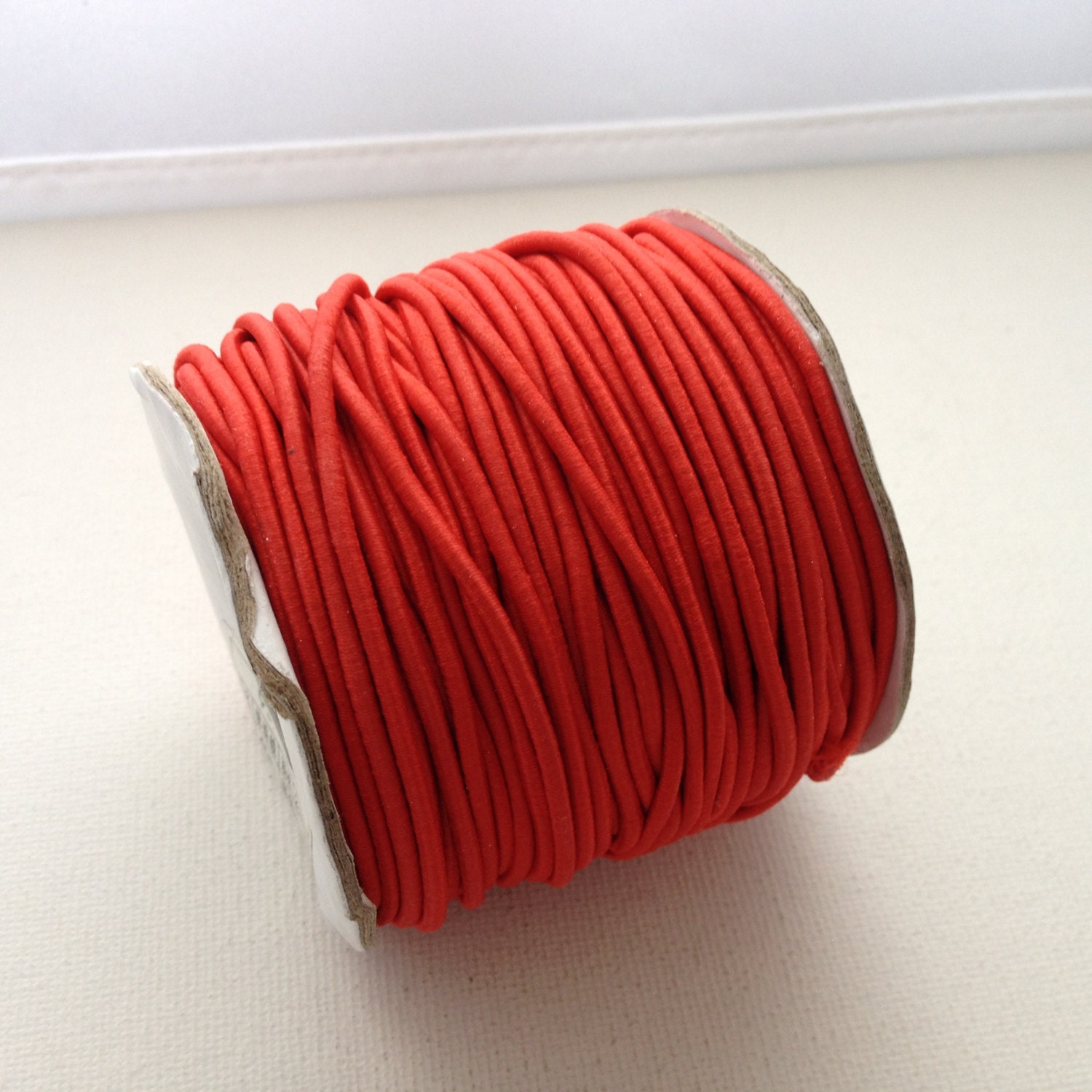 6 feet of 2mm Red Elastic Cord Fabric Covered Rubber