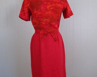 1960's Red Wiggle Dress Stephan Ltd. Bright red with bow accent at the waist.