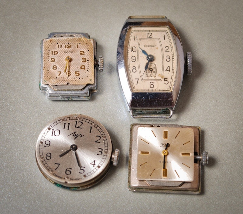 Set of 4 Vintage watch movement, watch parts, watch faces.