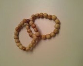 One Palo Santo Sacred Naturally Aromatic Bracelet. 20 Beads. Elastic band. Wild harvested.
