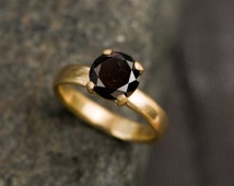 Gold and black diamond engagement ring