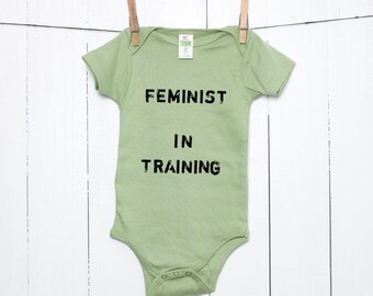 Feminist In Training Organic Cotton Baby Bodysuit Infant Creeper One Piece Avocado Green Baby Sustainable Clothing Grunge Distressed Style