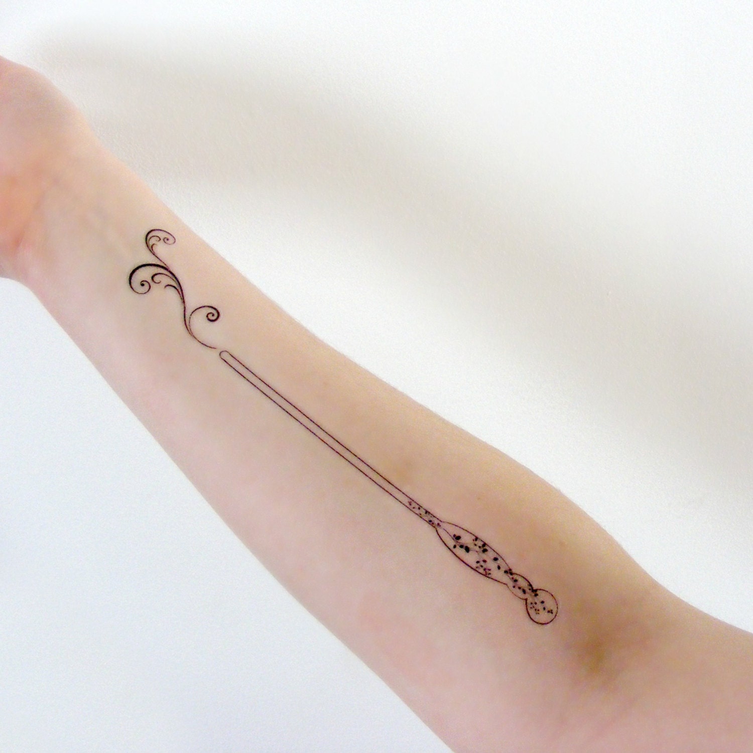 magic wand tattoo
