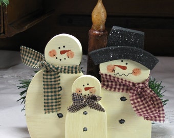 Wooden Snowman Family With Shelf, Candle And Greenery