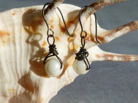 Dark steel wire earrings with white glass bead