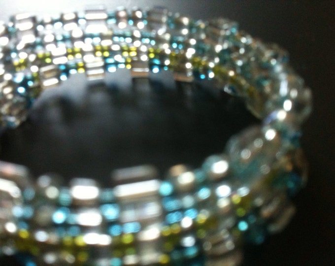 light blue and apple green glass memory wire bracelets