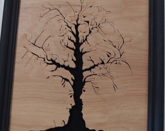 Scroll Saw Tree with 10 Faces Picture