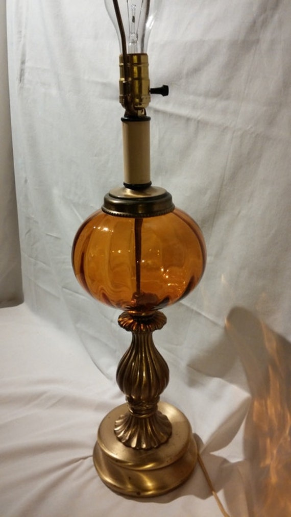 Vintage Table Lamp. Amber Glass Globe With Brass Base. In