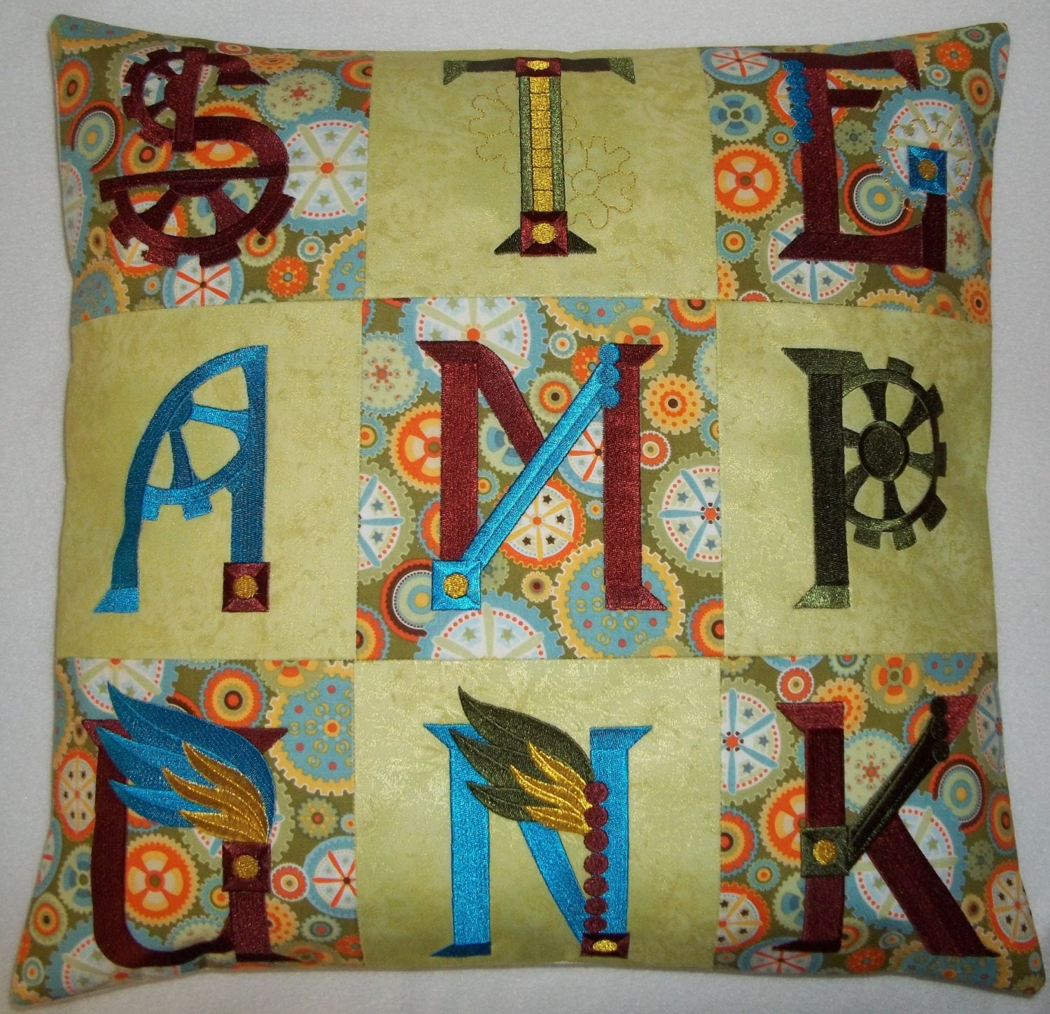 Machine embroidered Steampunk cushion cover\ throw pillow cover, Steampunk alphabet, with clockwork fabric , measures approx. 17in x 17in.