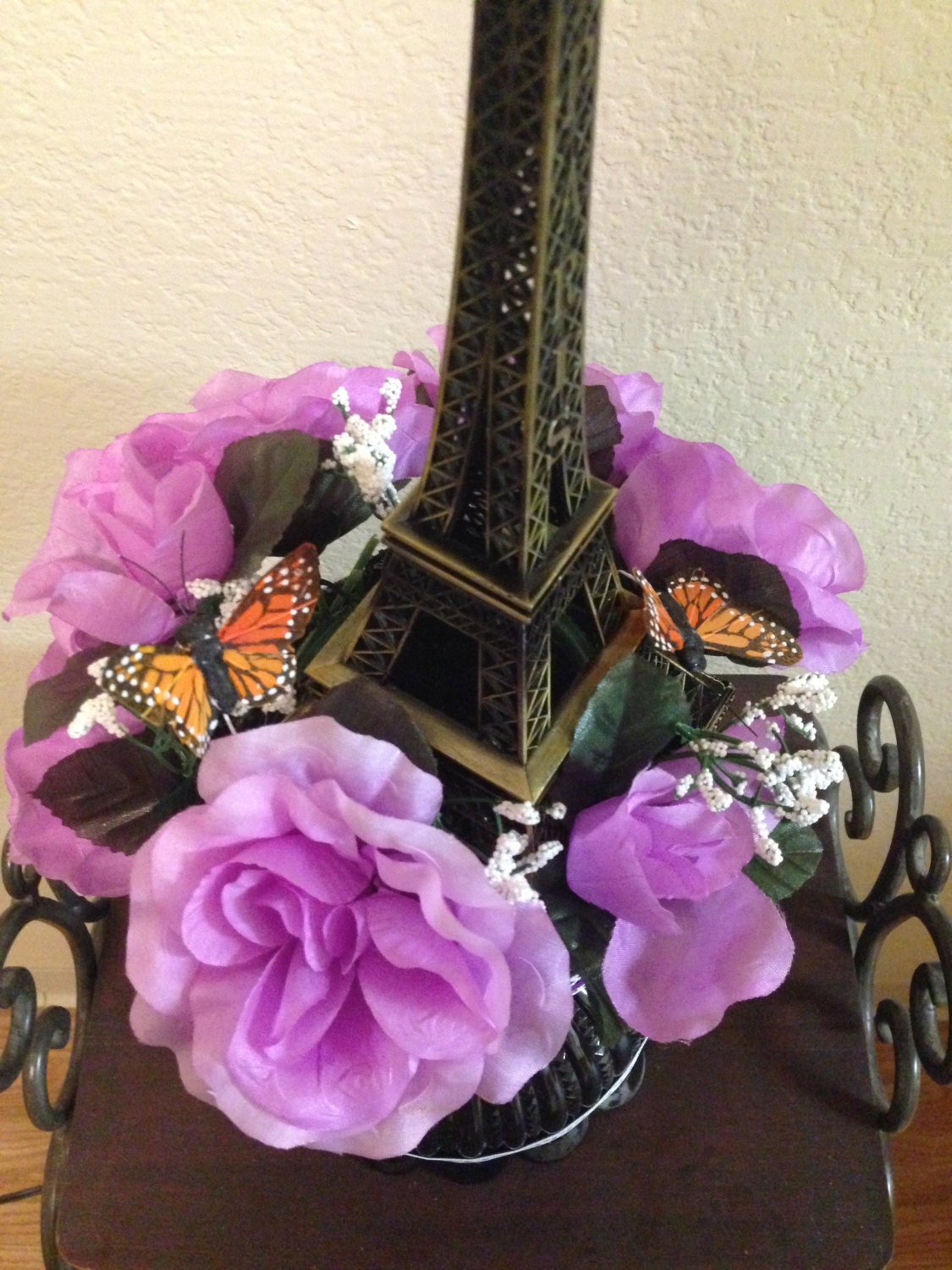 Eiffel Tower Centerpiece with butterflies and flowers for a