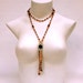Glass flapper necklace, long tassel fringe, champagne peach purple