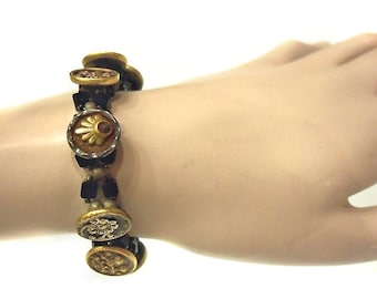 Beautiful antique vintage button bracelet / 9 buttons / shiny black beads / decorative silver clasp