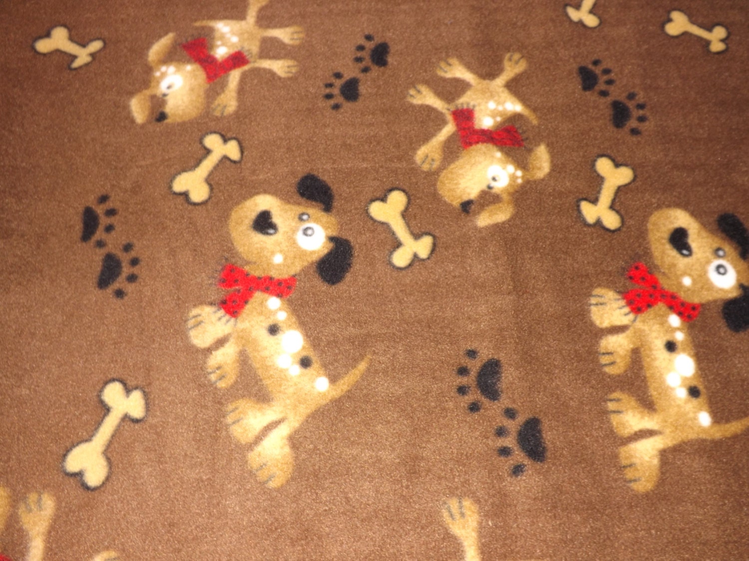 Fleece Fabric BTY Brown fleece with dogs by MamaBearsFleece