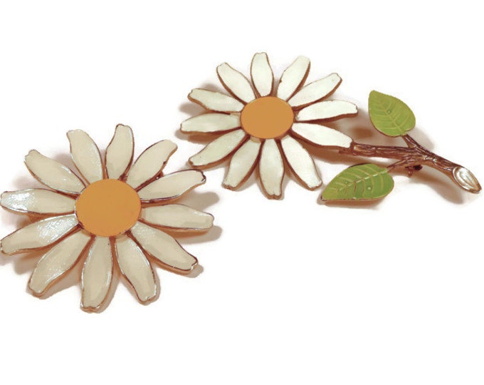 1960s daisy pair of enamel daisy brooches white with yellow center