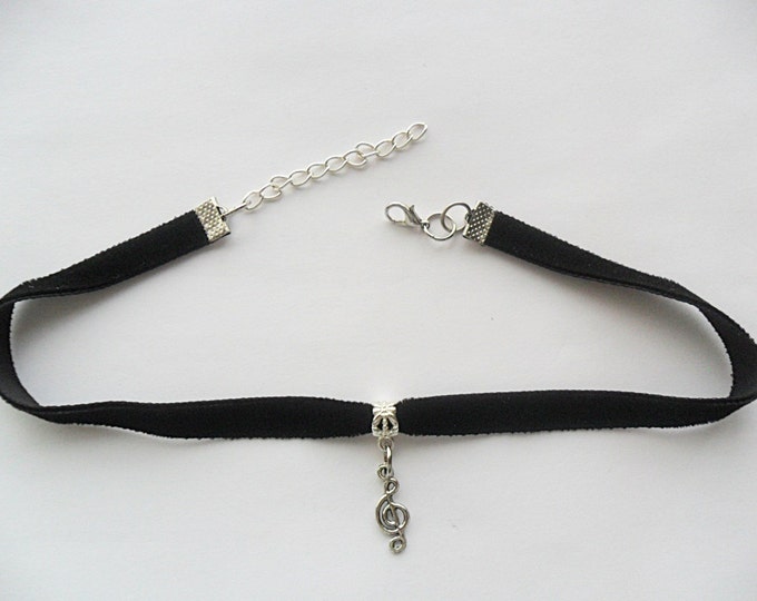 Velvet choker with treble clef note charm and a width of 3/8” Ribbon Choker Necklace (pick your neck size)