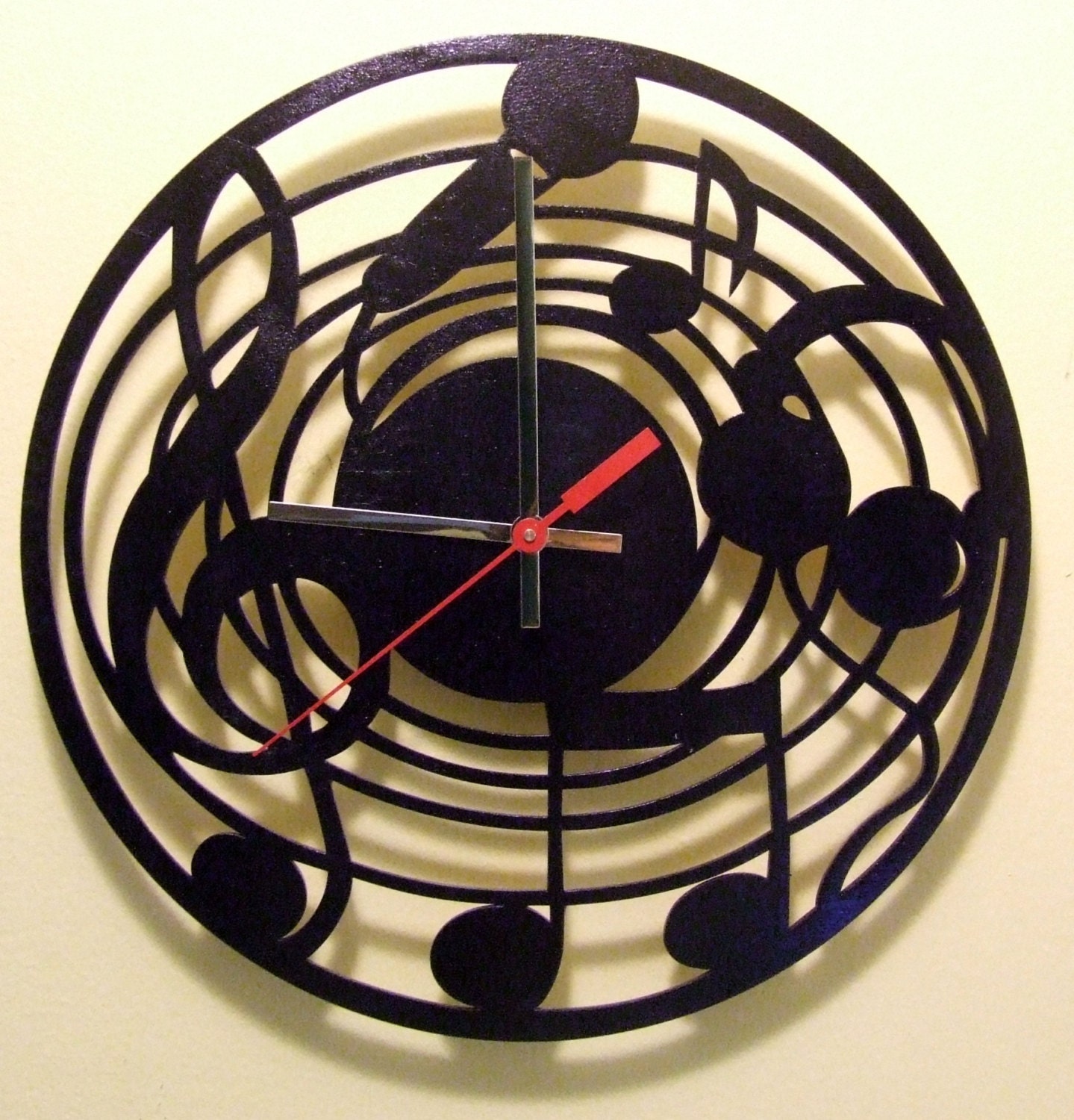 Music Nots wooden wall clock.