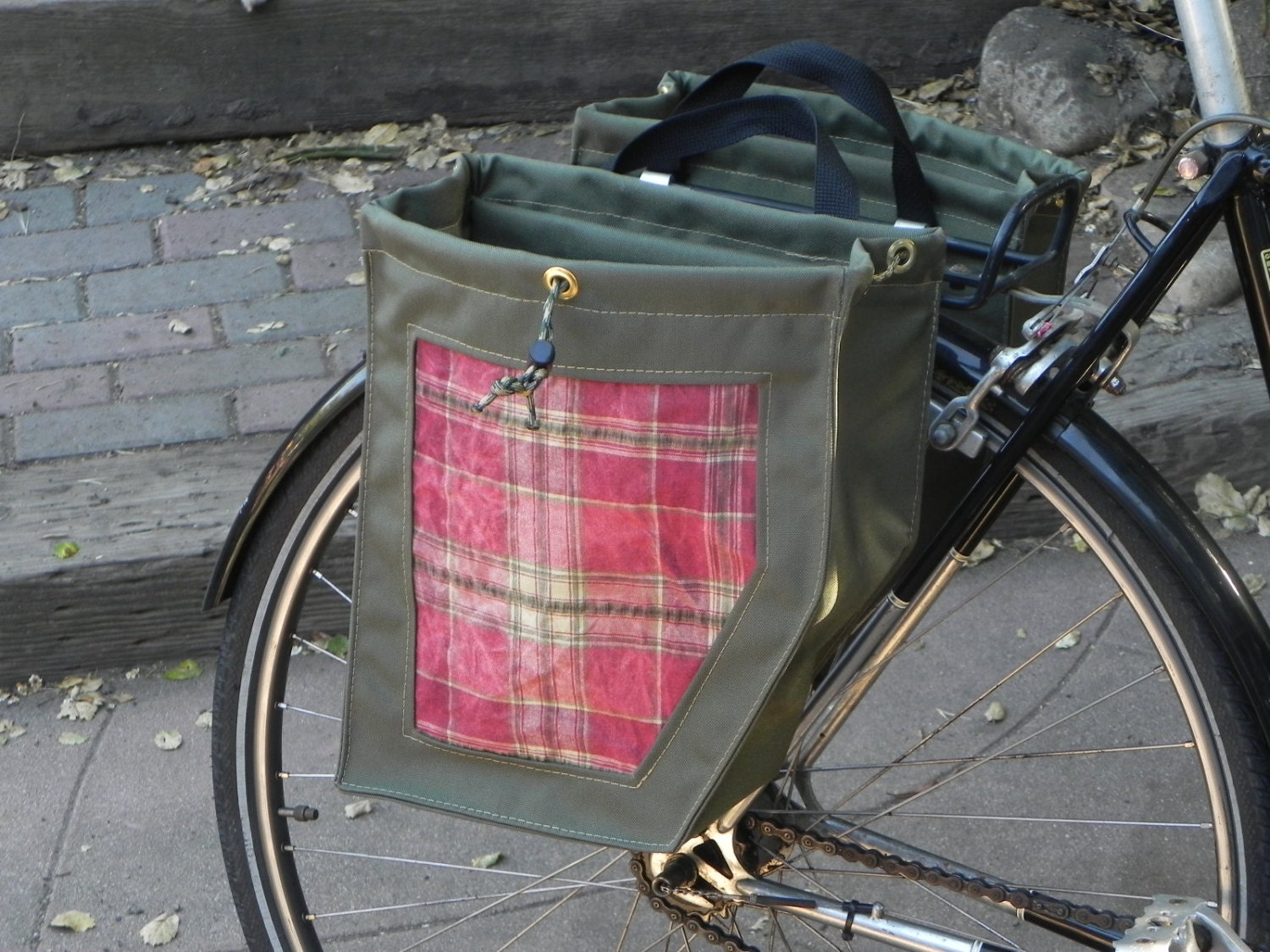 Green bicycle panniers/bike bags with red plaid waxed fabric