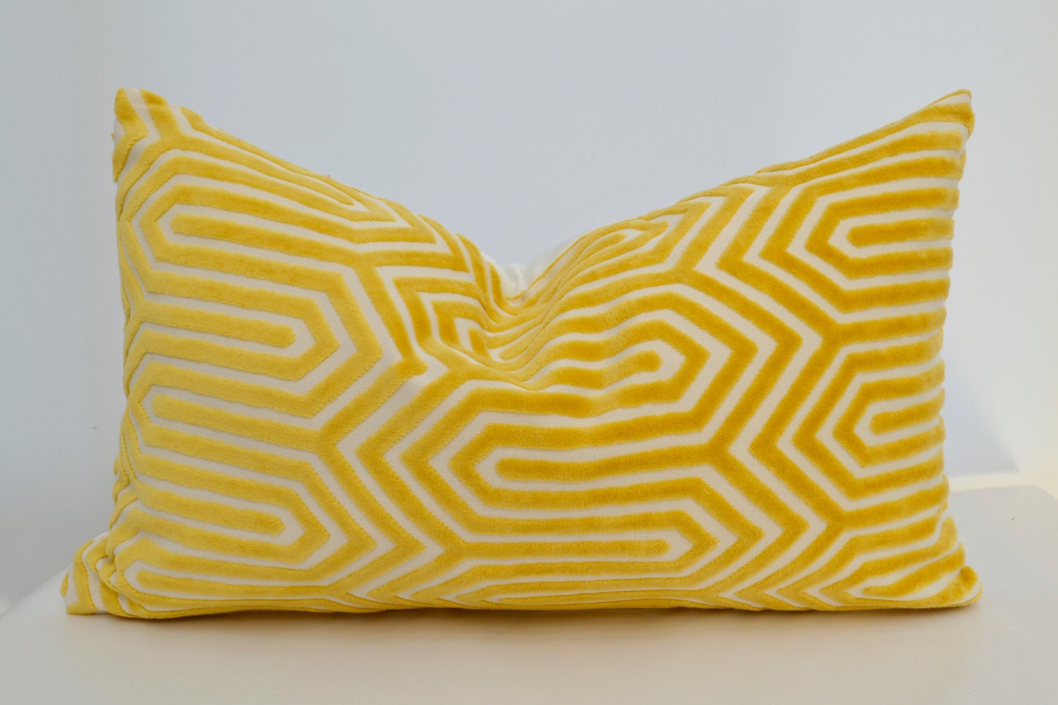 yellow plush pillow