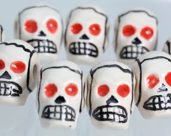 Ceramic Red Eyed Skull beads. Crafts, Jewellery Making Projects x 10