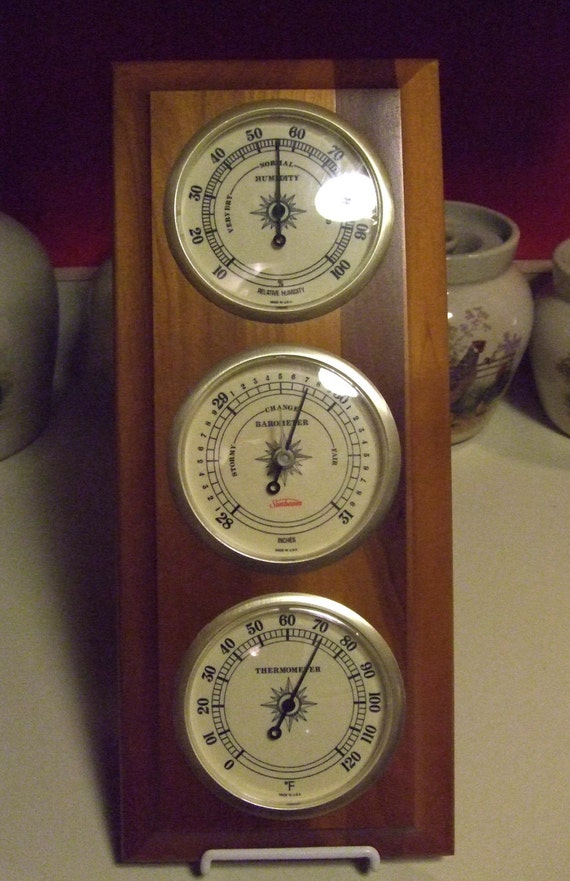 brass weather indicator