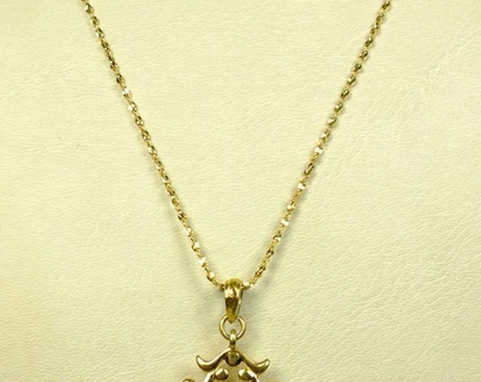 Storewide 25% Off SALE Very pretty goldtone pendant necklace features lovely Victorian style openwork pendant