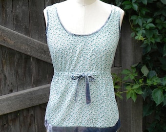 Cotton floral sleeveless top in Small