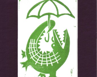 Alligator Holding and Umbrella