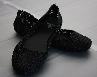 black jelly ballet flats