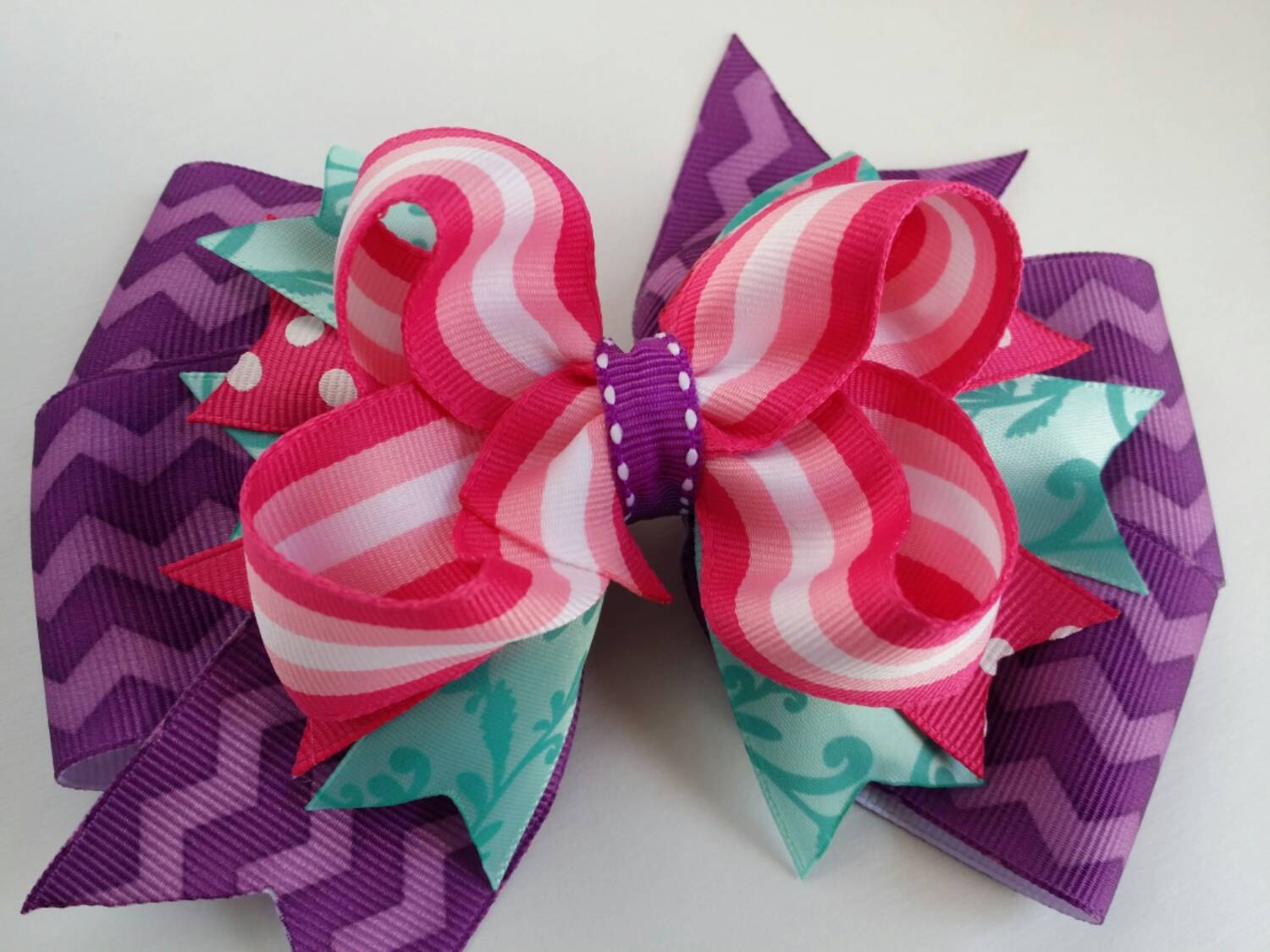 Pink and purple hair bow pink and blue and purple ribbon bow